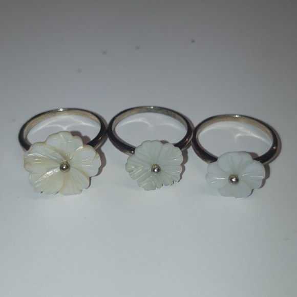 Two sets of flower stackable rings - Picture 3 of 4